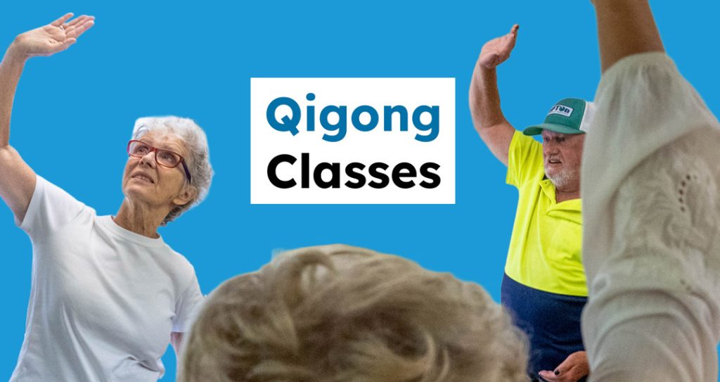 3 people participating in a Qigong class